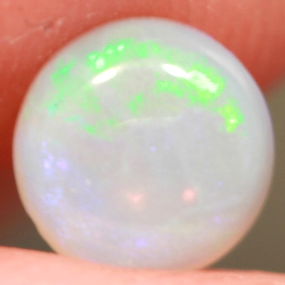 SOLID CRYSTAL OPAL Bright green rolling flash